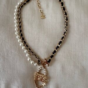 CHANEL Gold and Black Necklace with Pearl Details